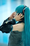 aqua_hair blouse cosplay detached_sleeves hatsune_miku headset kei tie twintails vocaloid rating:Safe score:0 user:nil!