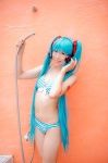 aqua_hair bikini cleavage cosplay hatsune_miku headset mashiro_yuki project_diva swimsuit twintails vocaloid rating:Safe score:0 user:nil!