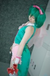 bow collar cosplay cuffs green_hair hairbow macross macross_frontier microphone miki ranka_lee red_eyes shorts thighhighs tie twintails vest rating:Safe score:0 user:pixymisa