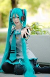 aqua_hair ayame blouse cosplay default_costume detached_sleeves hatsune_miku headset pleated_skirt skirt thighhighs tie twintails vocaloid zettai_ryouiki rating:Safe score:0 user:nil!