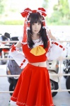 blouse cosplay detached_sleeves hairbow hakurei_reimu miko skirt touhou you_(ii) rating:Safe score:0 user:nil!