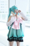 aqua_hair cosplay detached_sleeves dress hatsune_miku microphone tagme_song twintails uni vocaloid rating:Safe score:0 user:nil!
