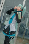 aqua_hair blouse cosplay detached_sleeves hatsune_miku headset maitako pleated_skirt skirt thighhighs tie twintails vocaloid rating:Safe score:1 user:pixymisa