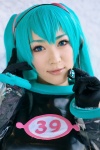 aira aqua_hair cosplay croptop elbow_gloves gloves hatsune_miku headset project_diva sleeveless twintails vocaloid rating:Safe score:0 user:nil!