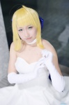 ahoge blonde_hair choker cosplay dress elbow_gloves fate/series fate/stay_night gloves hairbow nanohanana saber rating:Safe score:0 user:nil!