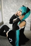 aqua_hair cosplay detached_sleeves hairbows hatsune_miku headset jumper project_diva ryuga thighhighs twintails vocaloid zettai_ryouiki rating:Safe score:0 user:nil!