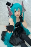 aqua_hair cosplay dress fingerless_gloves gloves hatsune_miku headset leggings shiina_haru top_hat twintails vocaloid rating:Safe score:0 user:nil!