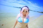 animal_ears beach bikini bunny_ears cleavage cosplay headphones nitro_super_sonic ocean pink_hair saku side-tie_bikini super_soniko swimsuit underboob rating:Safe score:4 user:nil!