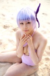 ayane_(doa) beach cleavage cosplay dead_or_alive headband ocean one-piece_swimsuit purple_hair swimsuit tachibana_minami rating:Safe score:0 user:nil!