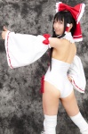 ass boots cosplay detached_sleeves hairbow hakurei_reimu kneepads lenfried miko one-piece_swimsuit swimsuit thighhighs touhou rating:Safe score:1 user:nil!