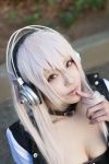 blonde_hair choker cleavage cosplay headphones jacket miyuki_(iii) nitro_super_sonic pink_eyes super_soniko tubetop rating:Safe score:0 user:pixymisa