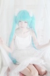 aqua_hair cosplay dress hatsune_miku tachibana_sakura twintails vocaloid rating:Safe score:3 user:pixymisa