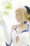 ahoge blonde_hair choker cleavage cosplay dress elbow_gloves fate/series fate/stay_night forest_(photoset) gloves hairbow saber usakichi rating:Safe score:1 user:nil!