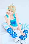blonde_hair blue_eyes bow cosplay dress hakuhi_kaede kagamine_len leggings pettipants polka_dots striped thighhighs vocaloid rating:Questionable score:0 user:pixymisa