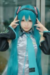 aqua_hair blouse cosplay detached_sleeves hatsune_miku headset tie touru twintails vocaloid rating:Safe score:0 user:pixymisa
