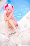 bikini_top cosplay hair_ribbons kaname_madoka mashiro_yuki miniskirt pink_hair pool puella_magi_madoka_magica skirt swimsuit twintails rating:Safe score:0 user:nil!