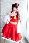 blouse cosplay detached_sleeves hairbow hakurei_reimu miko satori skirt touhou rating:Safe score:1 user:pixymisa