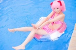 bikini_top cosplay hair_ribbons inner_tube kaname_madoka mashiro_yuki miniskirt pink_hair pool puella_magi_madoka_magica skirt swimsuit twintails wet rating:Safe score:0 user:nil!