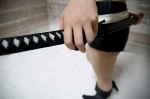 black_rock_shooter black_rock_shooter_(world) boots cosplay katana riyo shorts sword rating:Safe score:0 user:nil!