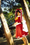 blouse cosplay detached_sleeves hairbow hakurei_reimu matsunaga_ayaka miko skirt socks touhou rating:Safe score:0 user:nil!