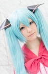 aqua_eyes aqua_hair bow cosplay dress harumiya_yun hatsune_miku twintails vocaloid rating:Safe score:1 user:pixymisa