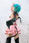aqua_hair chii cosplay dress elbow_gloves fingerless_gloves gloves hairbows hatsune_miku project_diva stirrup_socks tail twintails vocaloid world_is_mine_(vocaloid) rating:Safe score:2 user:nil!