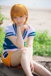 beach cosplay kuuya miniskirt nami_(one_piece) ocean one_piece orange_hair skirt tshirt rating:Safe score:1 user:nil!