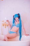 aqua_hair bathroom bathtub bikini cleavage cosplay hatsune_miku headset mashiro_yuki project_diva swimsuit twintails vocaloid rating:Safe score:0 user:nil!