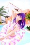 bikini cleavage cosplay fate/series fate/stay_night hair_ribbons inner_tube matou_sakura pool purple_hair sachi_budou side-tie_bikini swimsuit rating:Safe score:0 user:nil!