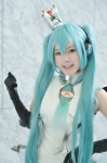 aqua_hair bodysuit cosplay crown elbow_gloves gloves half_skirt_open_front harun_(ii) hatsune_miku headset tagme_song vocaloid rating:Safe score:1 user:nil!