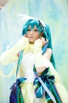 aqua_hair cosplay detached_sleeves dress hatsune_miku headdress jiruko twintails vocaloid rating:Safe score:0 user:pixymisa