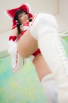 boots cosplay detached_sleeves hairbow hakurei_reimu kneepads lenfried miko one-piece_swimsuit swimsuit thighhighs touhou rating:Questionable score:0 user:nil!