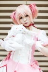 choker cosplay dress gloves hairbows kaname_madoka pink_hair puella_magi_madoka_magica twintails uriu rating:Safe score:0 user:xkaras
