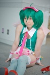 bow collar cosplay cuffs garter_straps green_hair hairbow macross macross_frontier microphone miki ranka_lee red_eyes shorts thighhighs tie twintails vest rating:Safe score:2 user:pixymisa