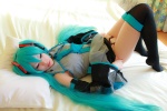 aqua_hair arai_yomi bed blouse cosplay detached_sleeves hatsune_miku headset panties pleated_skirt skirt thighhighs tie twintails vocaloid rating:Safe score:3 user:nil!