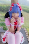 blouse blue_hair bonnet bow cleavage cosplay croptop half_skirt_open_front lenfried remilia_scarlet tail_plug thighhighs touhou wings rating:Safe score:0 user:nil!