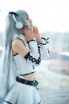 cosplay detached_sleeves halter_top hatsune_miku headset pleated_skirt shuuto silver_hair skirt twintails vocaloid voice_(vocaloid) rating:Safe score:0 user:pixymisa