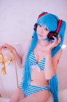 aqua_hair bathroom bathtub bikini cleavage cosplay hatsune_miku headset mashiro_yuki project_diva swimsuit twintails vocaloid rating:Safe score:0 user:nil!