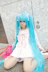 aqua_hair bow cosplay dress hatsune_miku lots_of_laugh_(vocaloid) plushie rushi twintails vocaloid rating:Safe score:2 user:pixymisa