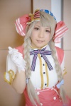 blonde_hair blouse cosplay gloves jumper love_live!_school_idol_project minami_kotori momiji_rio twin_braids rating:Safe score:0 user:nil!