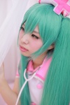 aqua_hair cosplay hatsune_miku hiiragi_haruka nurse nurse_cap nurse_uniform stethoscope twintails vocaloid rating:Safe score:0 user:pixymisa