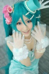 a-mi aqua_hair cinnamon_roll_(vocaloid) cleavage cosplay dress gloves hatsune_miku top_hat twintails vocaloid rating:Safe score:0 user:nil!