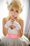 blonde_hair cleavage cosplay dress fingerless_gloves gloves headset kagamine_rin magnet_(vocaloid) momose_riyu vocaloid rating:Safe score:2 user:nil!