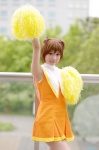 cardcaptor_sakura cheerleader cosplay hair_ribbons kinomoto_sakura pom_poms zero_inch rating:Safe score:0 user:nil!