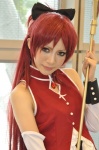 aisera_mune cosplay detached_sleeves hairbow puella_magi_madoka_magica red_hair sakura_kyouko staff rating:Safe score:0 user:pixymisa
