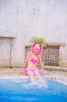 bikini_top cosplay hair_ribbons kaname_madoka mashiro_yuki miniskirt pink_hair pool puella_magi_madoka_magica skirt swimsuit twintails wet rating:Safe score:0 user:nil!