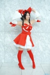 cosplay detached_sleeves dress hairbow hakurei_reimu kishigami_hana miko thighhighs touhou zettai_ryouiki rating:Safe score:2 user:nil!