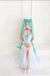 aqua_hair collar cosplay dress hairbow hatsune_miku koyuki tagme_song twintails vocaloid rating:Safe score:1 user:lolzin