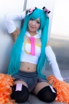 aqua_hair cheerleader_uniform collar cosplay detached_sleeves hair_ribbons hatsune_miku miniskirt mogu pleated_skirt pom_poms sing_and_smile_(vocaloid) skirt thighhighs tie tubetop twintails vocaloid rating:Safe score:1 user:pixymisa