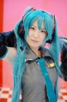 aqua_hair blouse cosplay detached_sleeves hatsune_miku headset hiro tie twintails vocaloid rating:Safe score:0 user:nil!